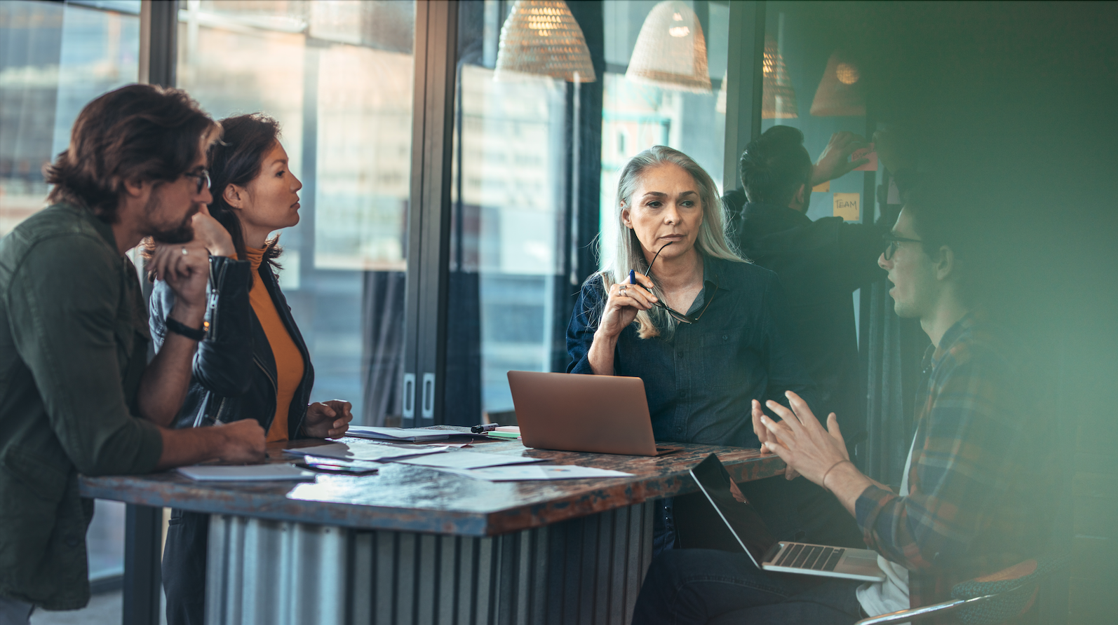 people having a meeting in an office